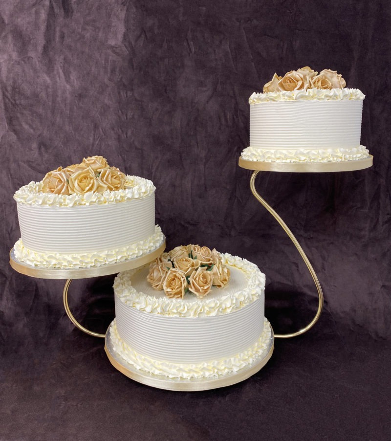 wed 11 scaled <div class="woocommerce-product-details__short-description" style="text-align: center;">3 Tier wedding cake on a stand with antique gold flowers</div>